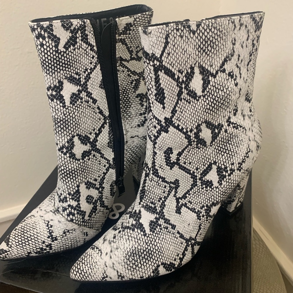 White and black snake skin booties